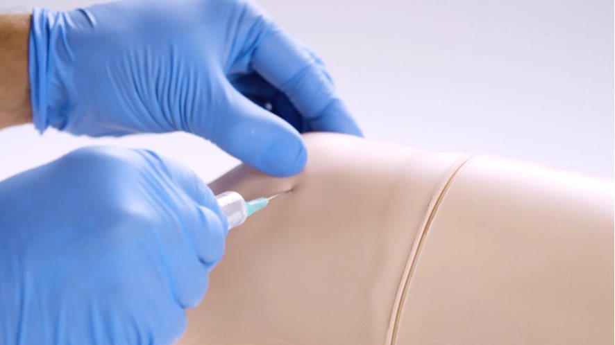 Palpation guided aspiration of the knee using the Knee Aspiration & Injection Trainer in Light Skin Tone
