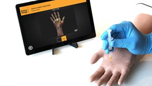 Trigger finger injection using the Hand & Wrist Injection Trainer with tablet in light skin tone 