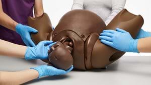 Birthing Simulator PROMPT Flex Standard version in dark skin tone birth demonstration 